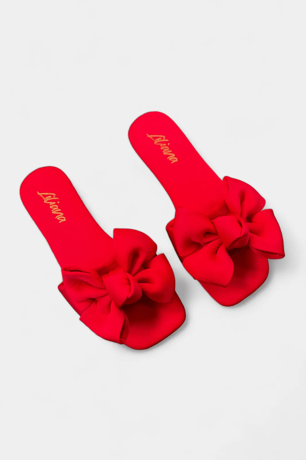 Elegant Flat Sandals with Stylish Red Bow Accent