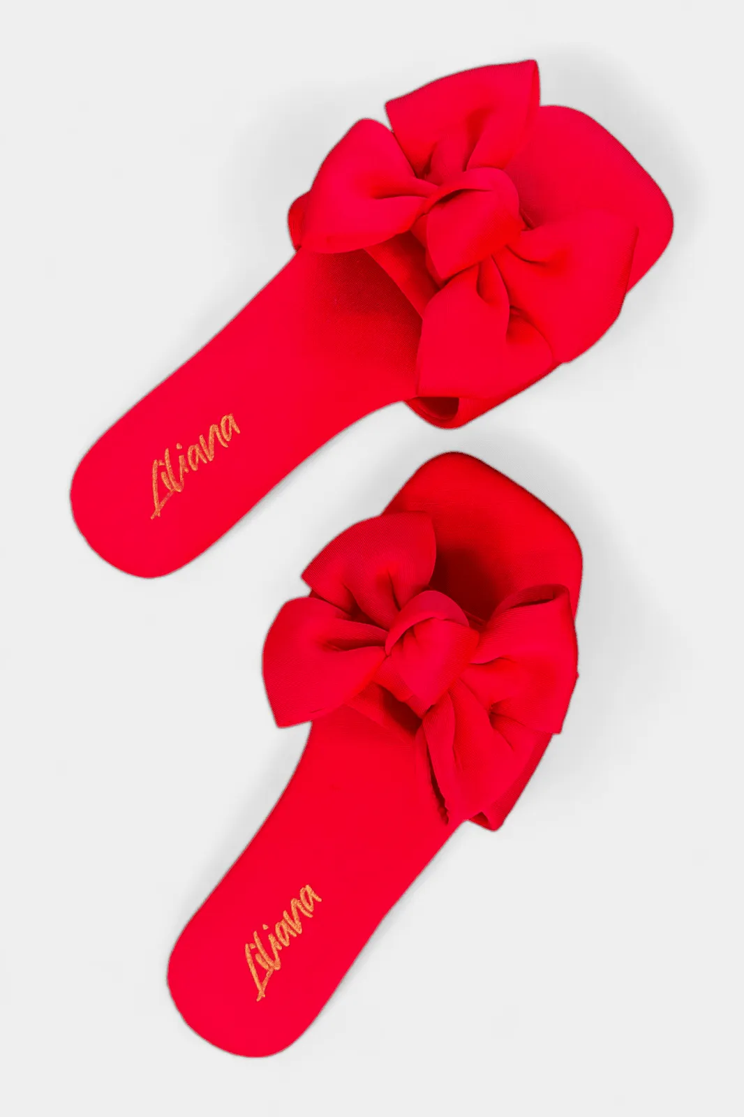 Elegant Flat Sandals with Stylish Red Bow Accent